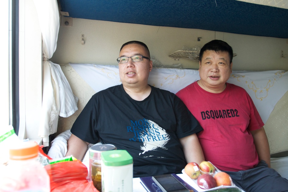 These were the other two guys in the same sleeping compartment as us. The guy in the black shirt snores like crazy.