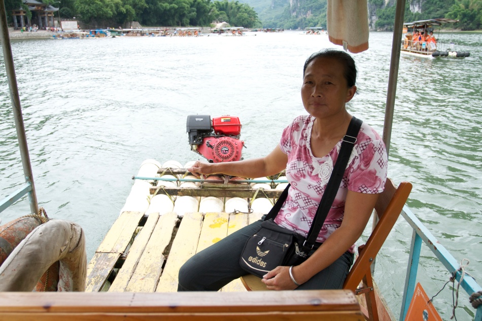 This was our raft driver for the Li River. We were on a motorized raft that could sit 4-5 people.