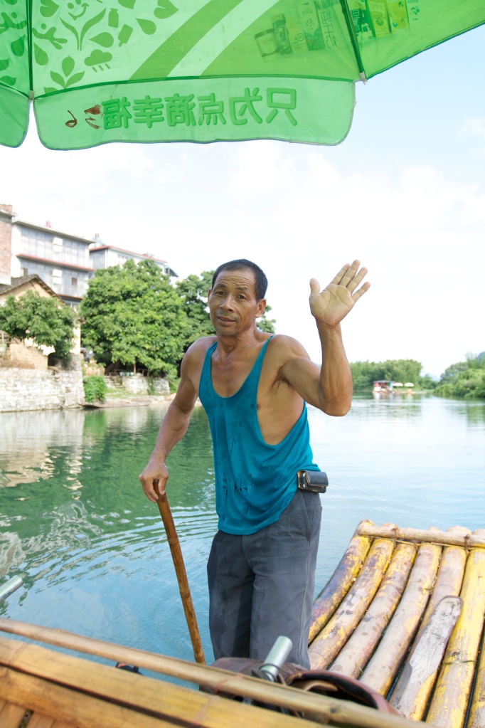 Our driver for the real bamboo raft on the Yulong River